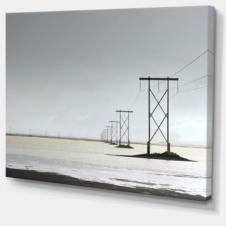Electricity Pylons over Lagoon - Landscape Canvas Wall Artwork