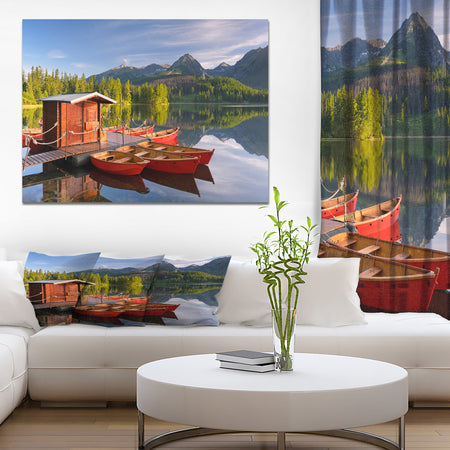 Red boat in a mountain lake - Lake Landscapes Photographic on wrapped Canvas