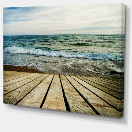 Wooden Pier in Waving Sea - Seascape Photo Canvas Print
