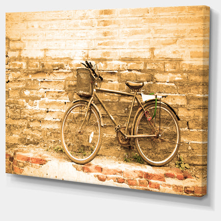 Vintage Bicycle against Brown Wall - Landscape Canvas Print