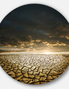 Drought Land under Cloudy Skies - Modern Landscape Disc Metal Wall Art