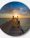 Huge Wooden Pier into Setting Sun - Sea Pier and Bridge Round Metal Wall Art