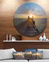 Huge Wooden Pier into Setting Sun - Sea Pier and Bridge Round Metal Wall Art