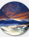 Fiery Clouds and Lit-up Villages - Landscape Photo Round Wall Art