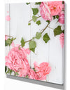 Pink Roses Facing Lying on Wood - Floral photography on Wrapped Canvas