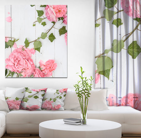 Pink Roses Facing Lying on Wood - Floral photography on Wrapped Canvas