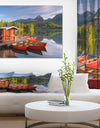 Red boat in a mountain lake - Lake Landscapes Photographic on wrapped Canvas