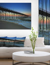 Pier sunrise in Blue Sky - Sea & Shore Photography on wrapped Canvas