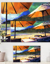 Sun umbrellas and loungers on beach - Cottage Canvas Wall Art