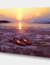 Flip flops with lovely hearts on the beach at sunset - Cottage Canvas Wall Art