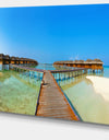 Bungalows in Maldives Island - Landscape Photo Canvas Print