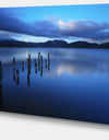 Dark Blue Sea with Pier Remains - Seascape Photo Canvas Print