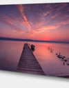 Wooden Pier Under Red Sky - Seascape Photo Canvas Print