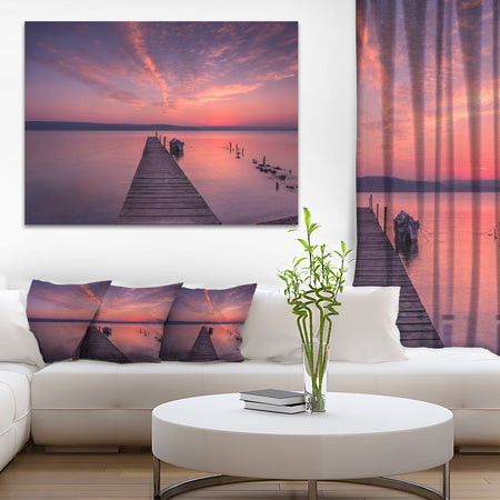 Wooden Pier Under Red Sky - Seascape Photo Canvas Print