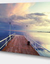 Pier Under Bright Sky - Seascape Photo Canvas Print
