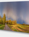 Green Field Under Rainbow Sky - Landscape Photo Canvas Print