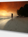 Woman Walking on Beach - Seashore Photo Canvas Art Print