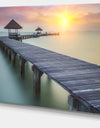 Wooden Sea Bridge and Sunset - Seashore Photo Canvas Print