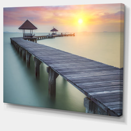 Wooden Sea Bridge and Sunset - Seashore Photo Canvas Print