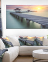 Wooden Sea Bridge and Sunset - Seashore Photo Canvas Print