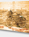 Vintage Bicycle against Brown Wall - Landscape Canvas Print