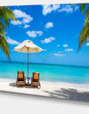 Turquoise Beach with Chairs - Seashore Photo Canvas Print