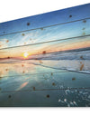 Blue Seashore with Distant Sunset - Seascape Print on Natural Pine Wood