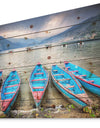 Row of Blue Boats in Pokhara Lake - Boat Print on Natural Pine Wood