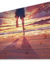 Man feet running in Sunset - People Sea & Shore Print on Natural Pine Wood